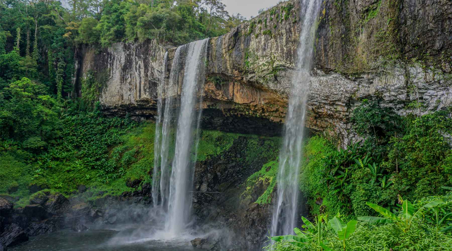 beautiful waterfall in central highland Vietnam - best motorcycle rides in Vietnam