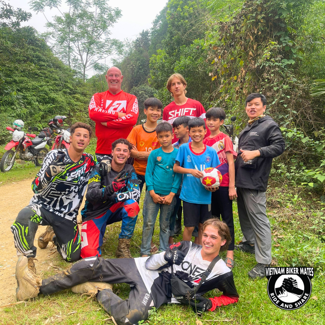 Riders engage in different activities while staying in VIetnam Homestay like playing with children